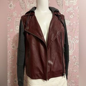 Burgundy vegan leather biker jacket w/ grey knit hood and sleeves.